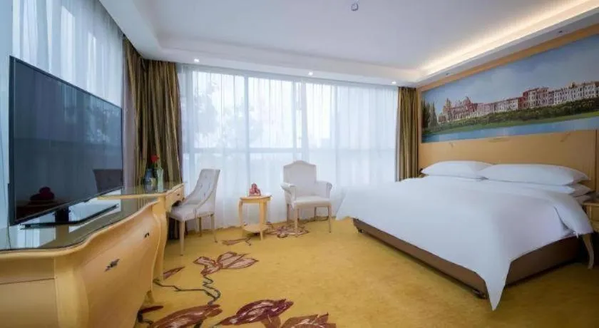 Bed in Vienna Hotel Wuhan Huazhong Normal University Huquan Metro Station