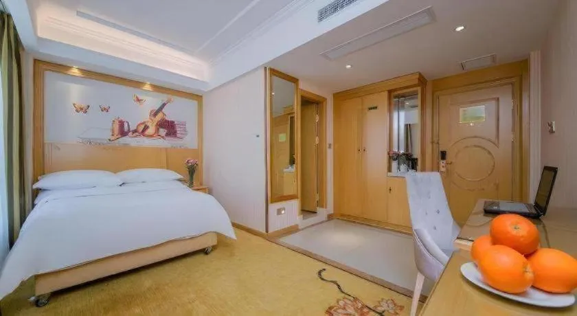 Bed in Vienna Hotel Wuhan Huazhong Normal University Huquan Metro Station