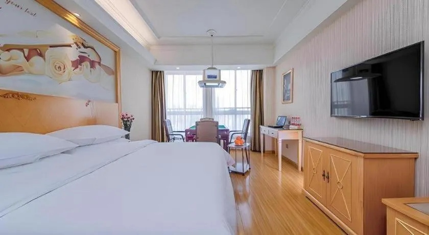 Bed in Vienna Hotel Wuhan Huazhong Normal University Huquan Metro Station