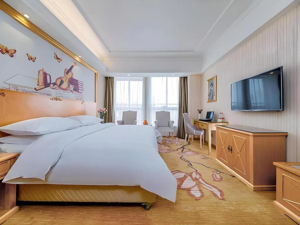 Bed in Vienna Hotel Wuhan Huazhong Normal University Huquan Metro Station