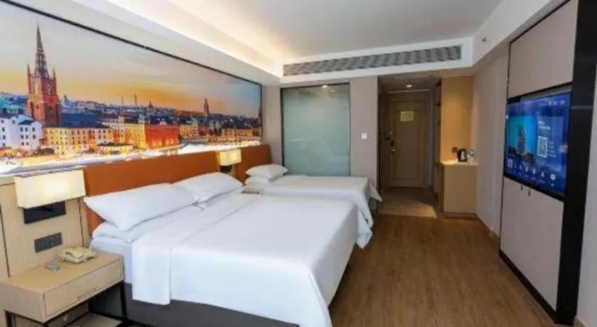 Bed in Vienna Hotel Shandong Jinan High-Tech Wanda Exhibition Center