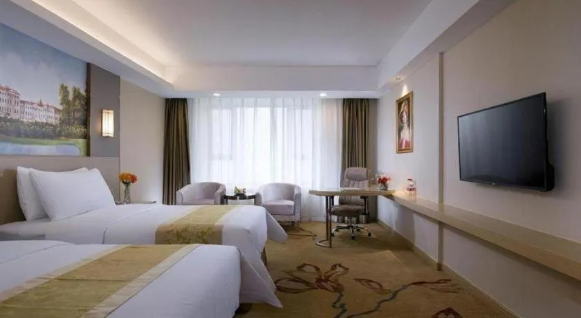 Bed in Vienna Hotel Shandong Jinan High-Tech Wanda Exhibition Center