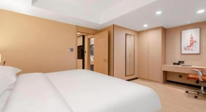 Bed in Vienna Hotel Shandong Jinan High-Tech Wanda Exhibition Center