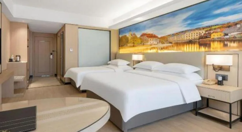Bed in Vienna Hotel Shandong Jinan High-Tech Wanda Exhibition Center