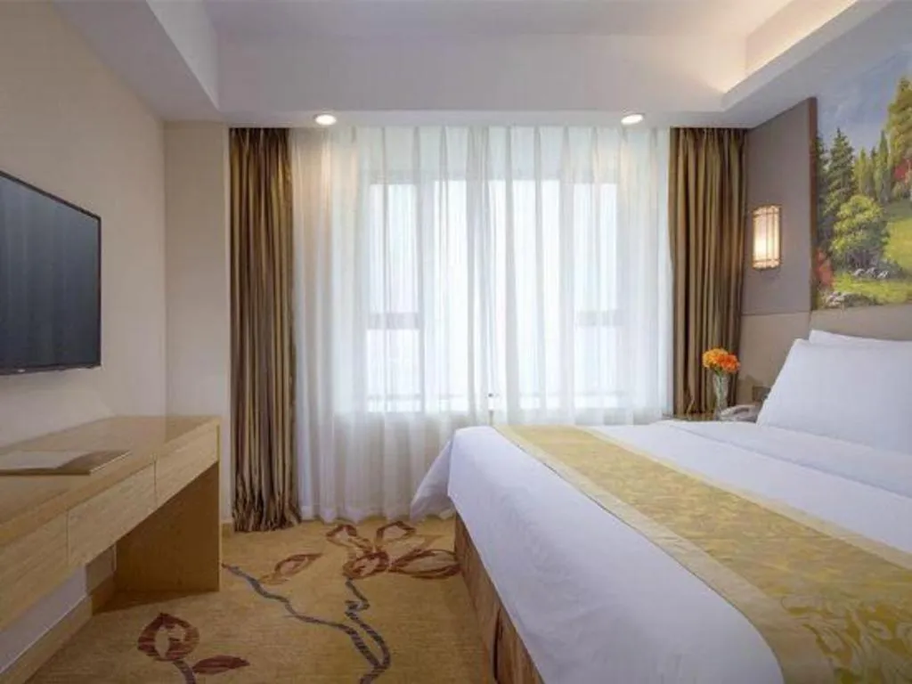 Bed in Vienna Hotel Shandong Jinan High-Tech Wanda Exhibition Center