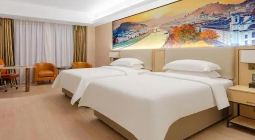 Bed in Vienna Hotel Shandong Jinan High-Tech Wanda Exhibition Center
