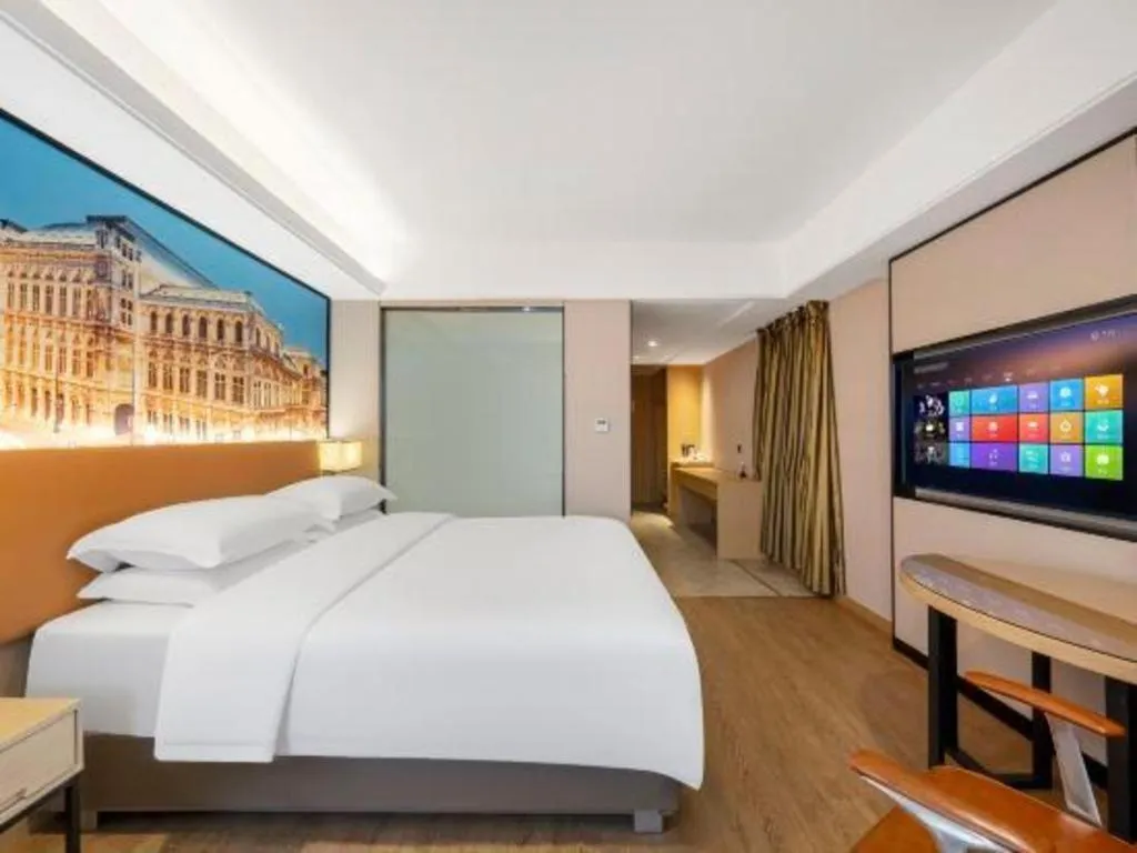 Bed in Vienna Hotel Shandong Jinan High-Tech Wanda Exhibition Center