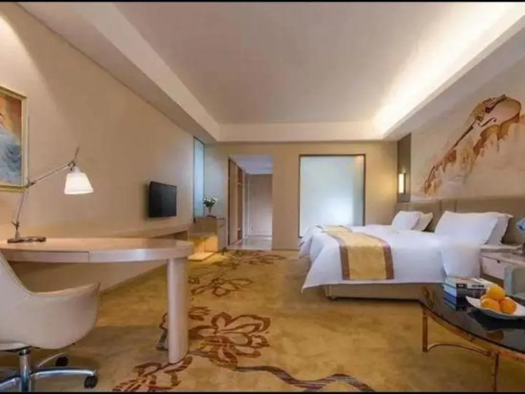 Bed in Vienna Hotel Shandong Jinan High-Tech Wanda Exhibition Center