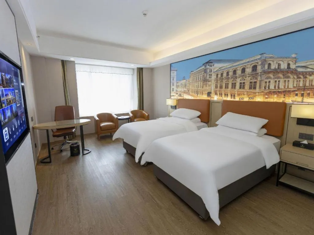Bed in Vienna Hotel Shandong Jinan High-Tech Wanda Exhibition Center