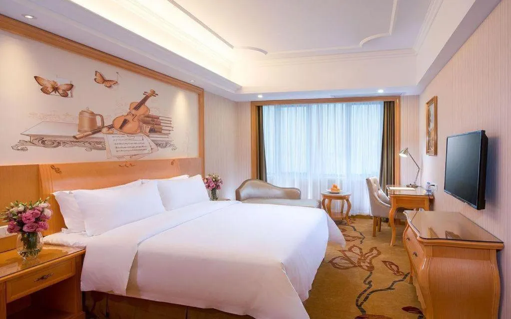 Bed in Vienna Hotel Shandong Jinan High-Tech Wanda Exhibition Center