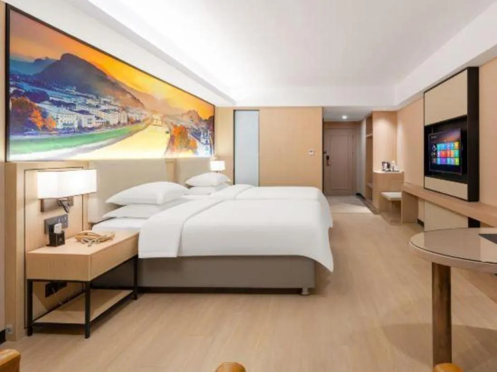Bed in Vienna Hotel Shandong Jinan High-Tech Wanda Exhibition Center