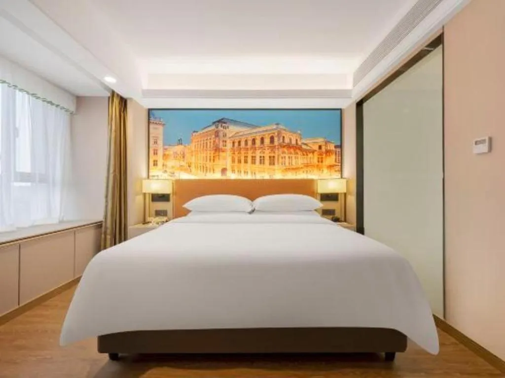 Bed in Vienna Hotel Shandong Jinan High-Tech Wanda Exhibition Center