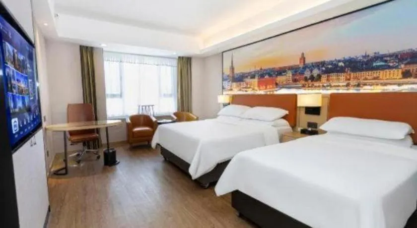 Bed in Vienna Hotel Shandong Jinan High-Tech Wanda Exhibition Center