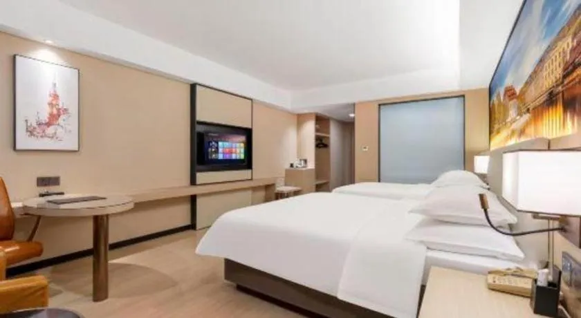 Bed in Vienna Hotel Shandong Jinan High-Tech Wanda Exhibition Center