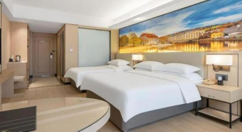 Bed in Vienna Hotel Shandong Jinan High-Tech Wanda Exhibition Center