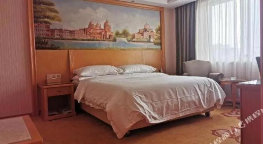 Bed in Vienna Hotel Zhejiang Ningbo Beilun In Time City