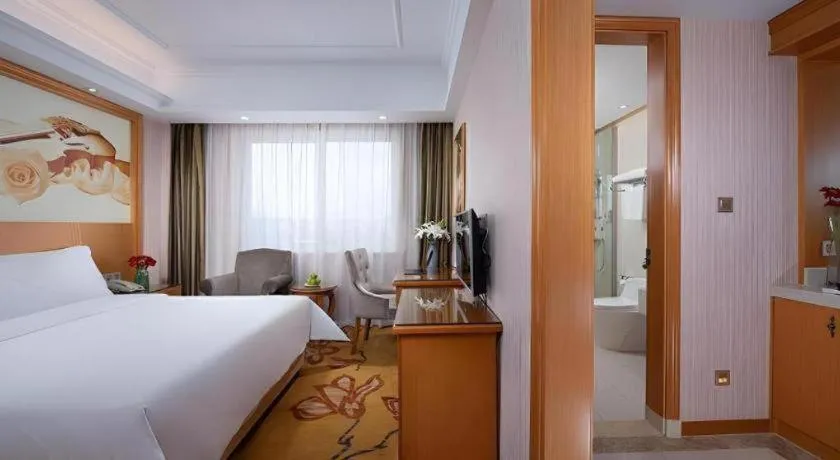 Bed in Vienna Hotel Zhejiang Ningbo Beilun In Time City