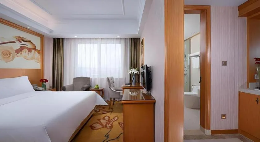 Bed in Vienna Hotel Zhejiang Ningbo Beilun In Time City