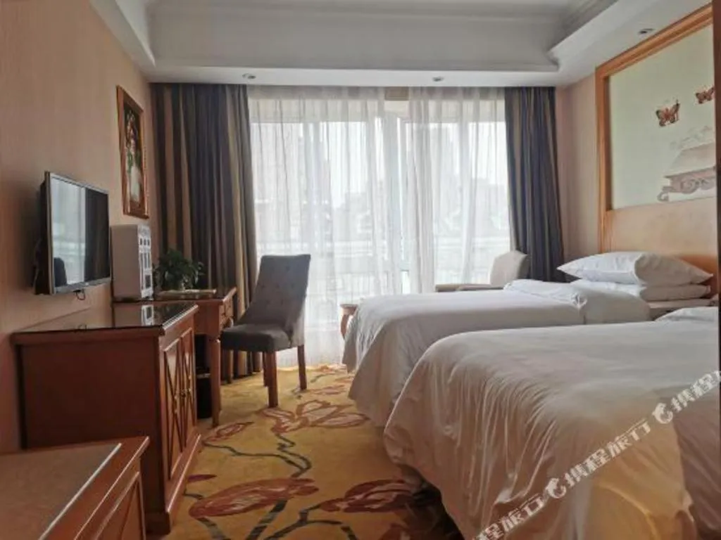Bed in Vienna Hotel Zhejiang Ningbo Beilun In Time City