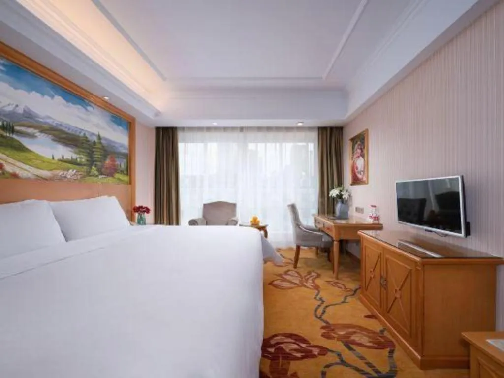 Bed in Vienna Hotel Zhejiang Ningbo Beilun In Time City