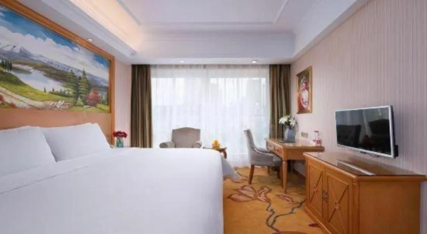 Bed in Vienna Hotel Zhejiang Ningbo Beilun In Time City
