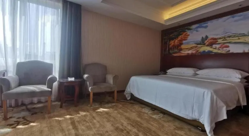 Bed in Vienna Hotel Zhejiang Ningbo Beilun In Time City