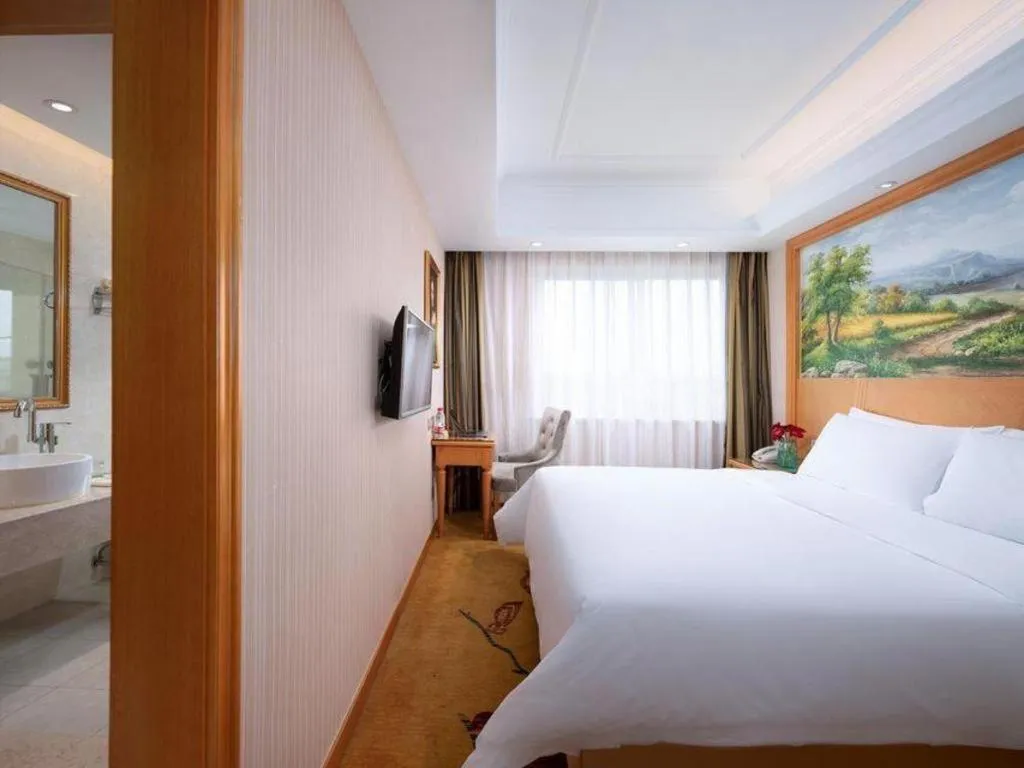 Bed in Vienna Hotel Zhejiang Ningbo Beilun In Time City