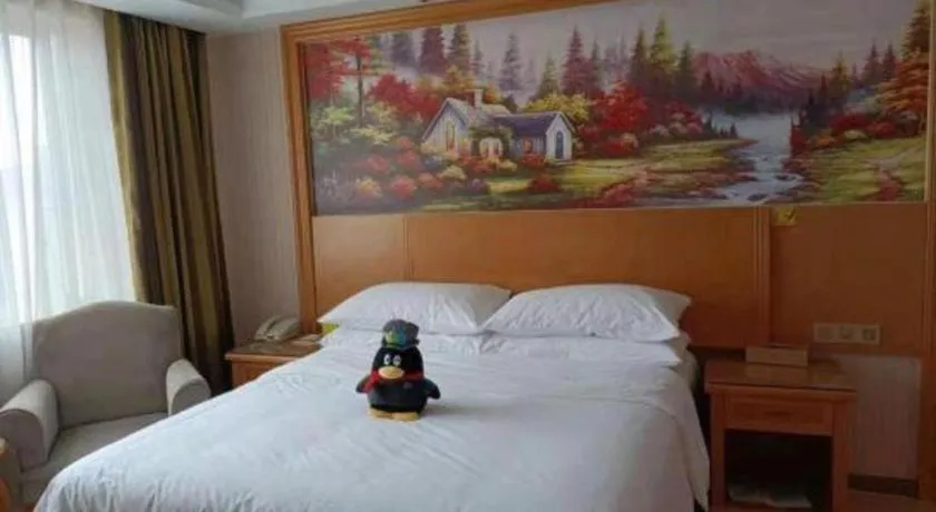Bed in Vienna Hotel Zhejiang Ningbo Beilun In Time City