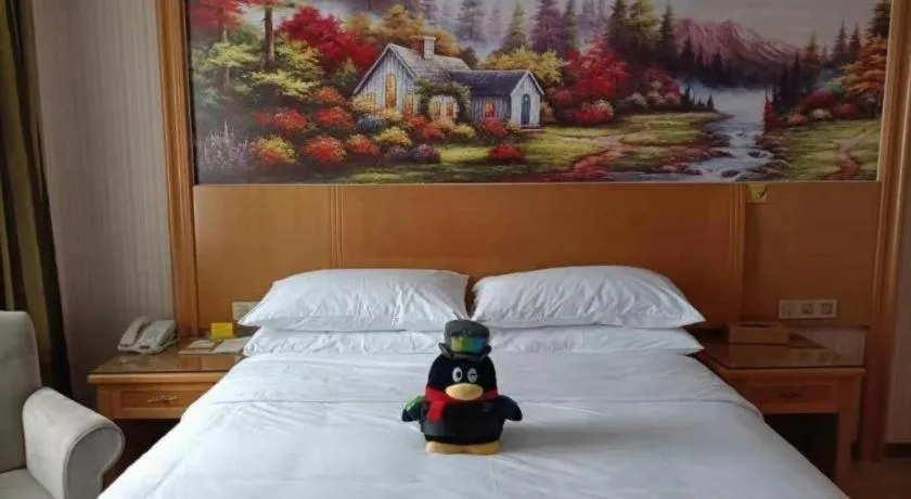 Bed in Vienna Hotel Zhejiang Ningbo Beilun In Time City