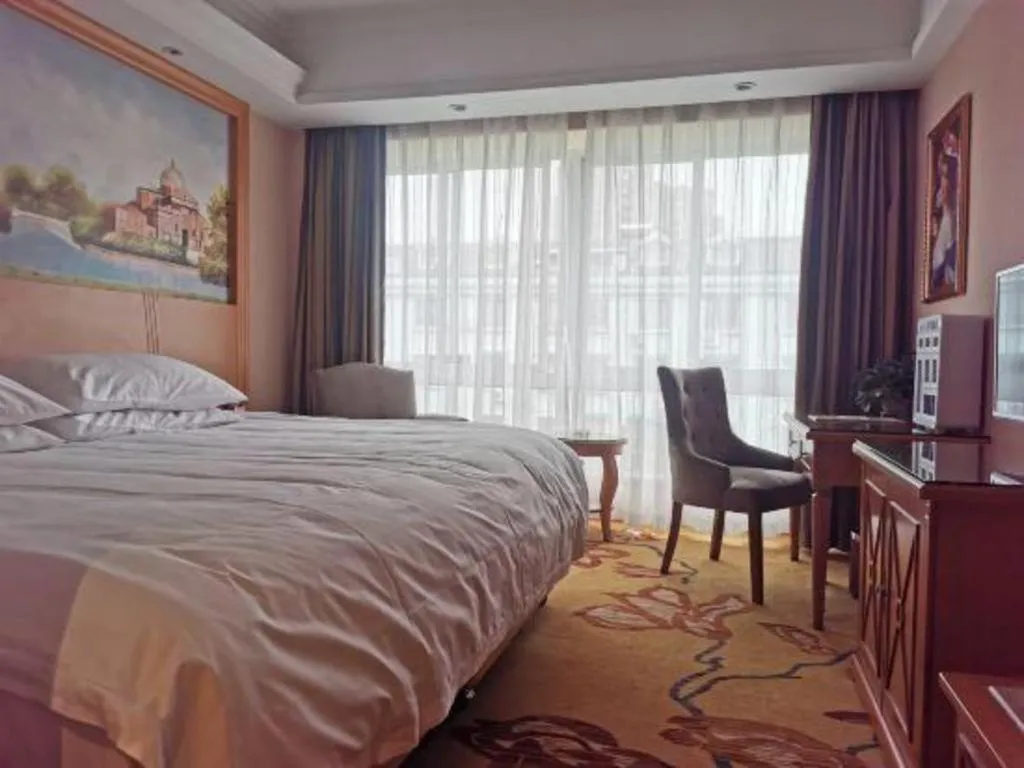 Bed in Vienna Hotel Zhejiang Ningbo Beilun In Time City