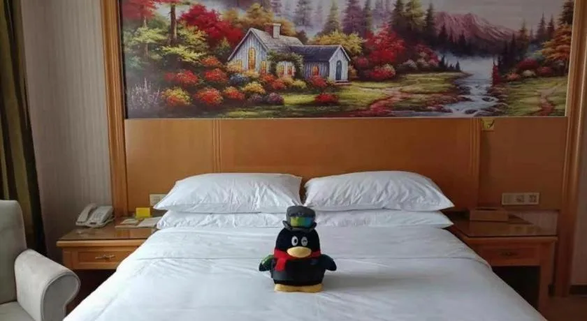 Bed in Vienna Hotel Zhejiang Ningbo Beilun In Time City