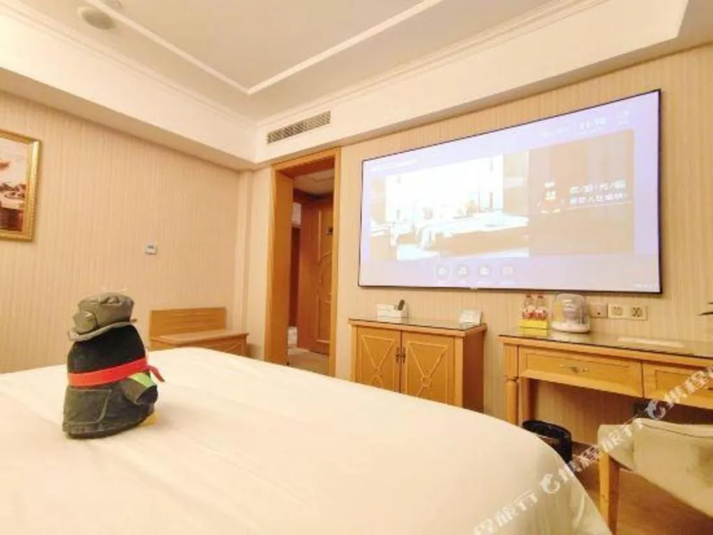 Bed in Vienna Hotel Zhejiang Ningbo Beilun In Time City
