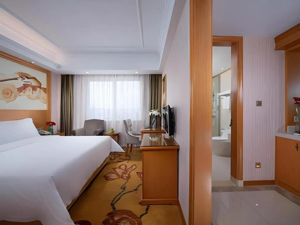 Bed in Vienna Hotel Zhejiang Ningbo Beilun In Time City