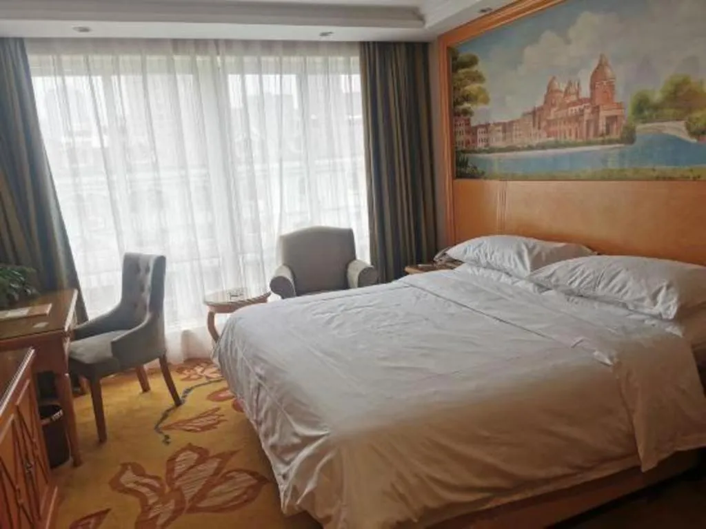 Bed in Vienna Hotel Zhejiang Ningbo Beilun In Time City