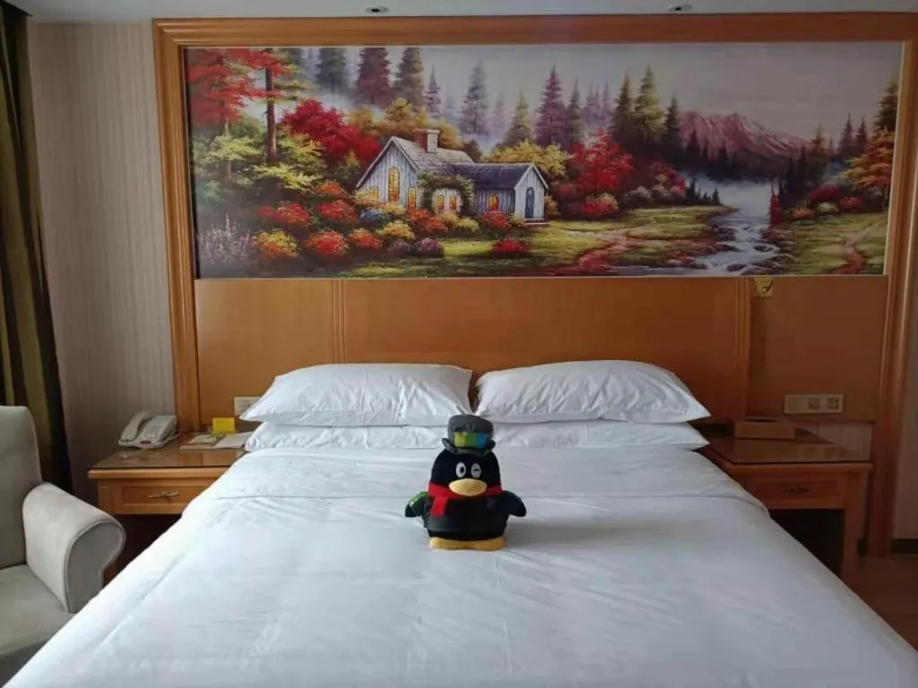 Bed in Vienna Hotel Zhejiang Ningbo Beilun In Time City