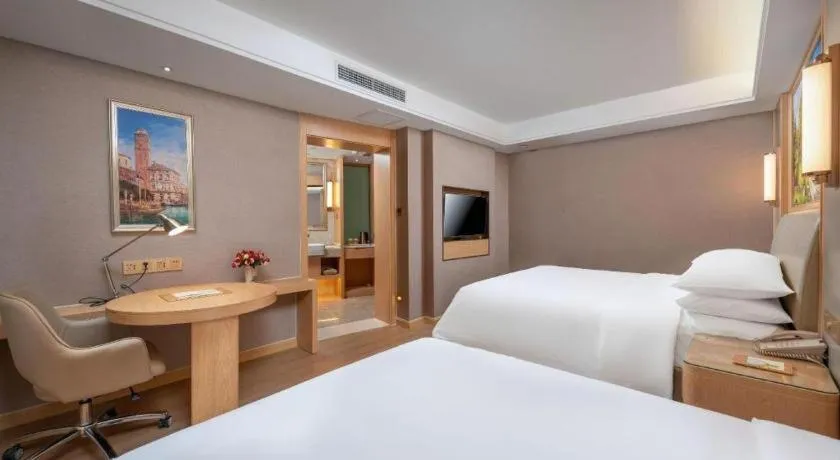 Bed in Vienna Hotel Tianjin Olympic Sports Center Tianta