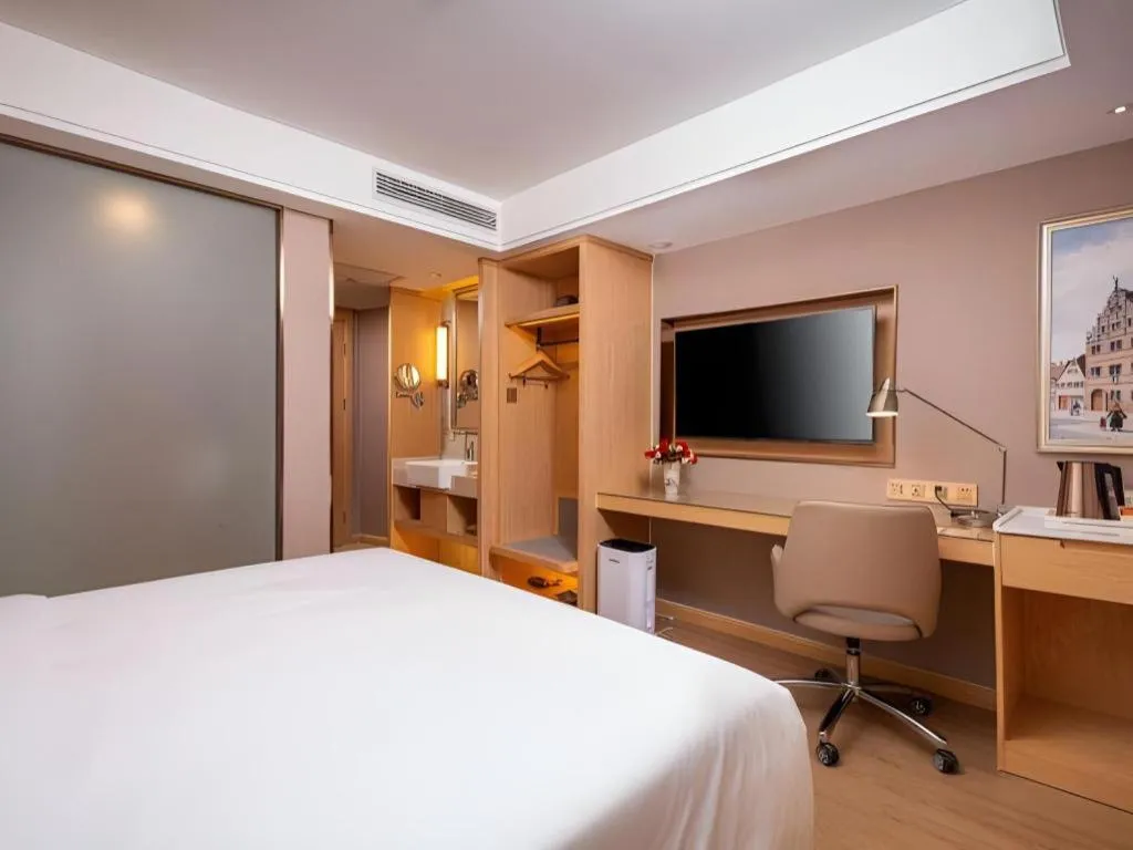 Bed in Vienna Hotel Tianjin Olympic Sports Center Tianta