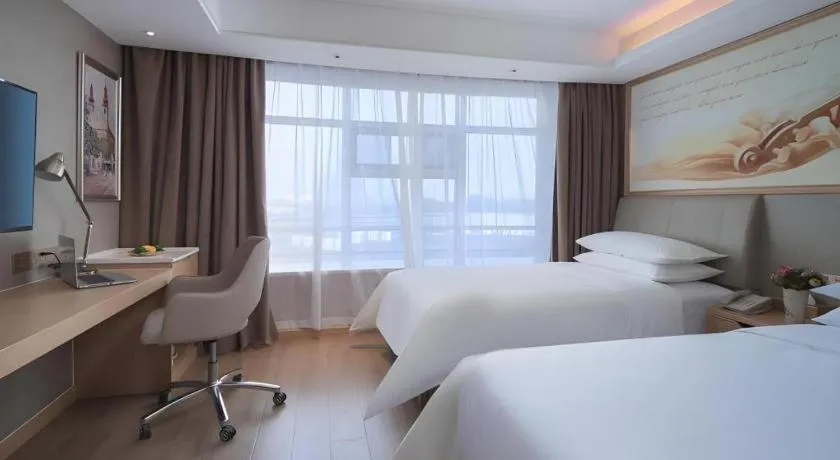 Bed in Vienna Hotel Tianjin Olympic Sports Center Tianta