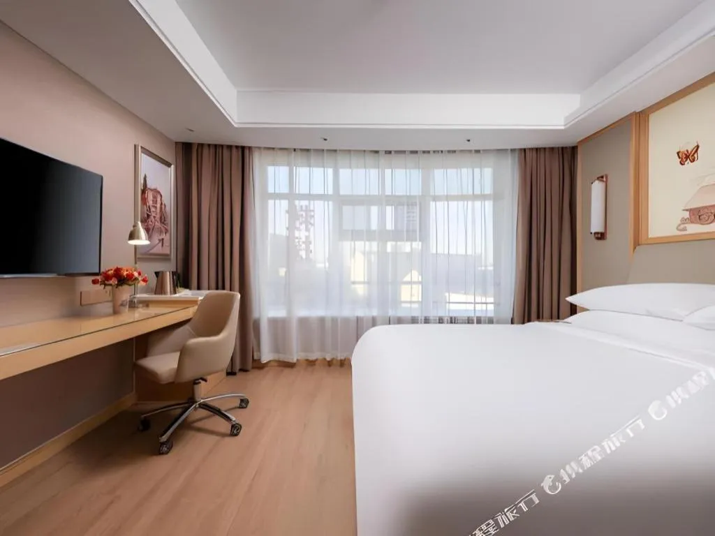 Bed in Vienna Hotel Tianjin Olympic Sports Center Tianta