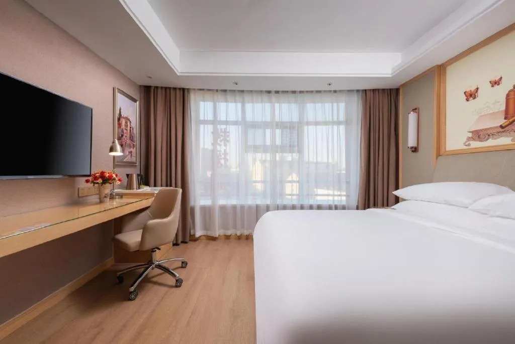 Bed in Vienna Hotel Tianjin Olympic Sports Center Tianta