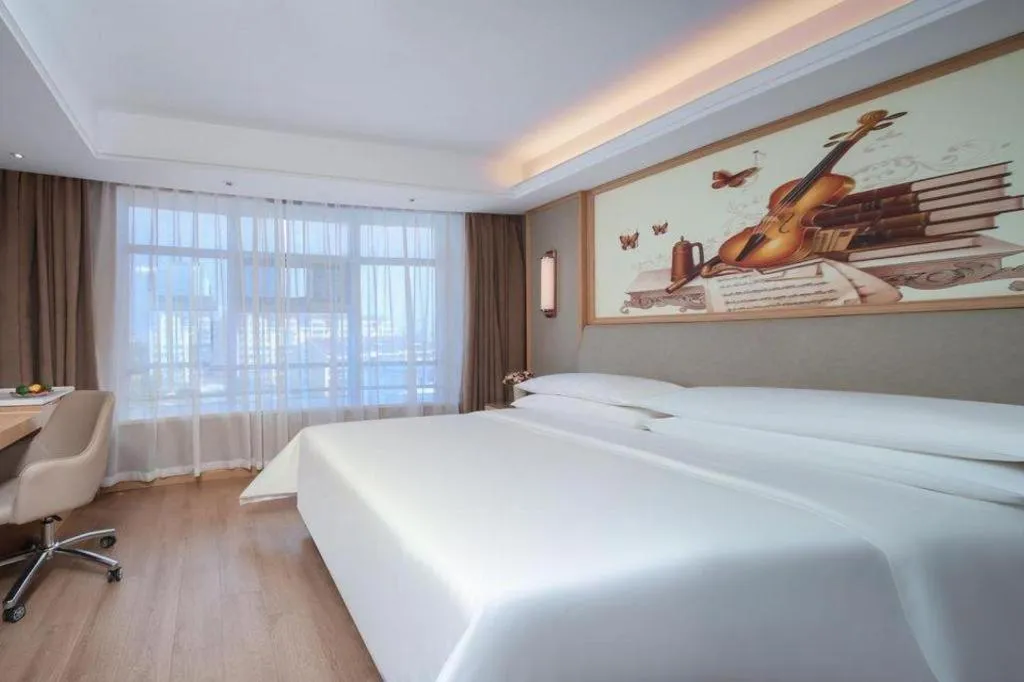 Bed in Vienna Hotel Tianjin Olympic Sports Center Tianta