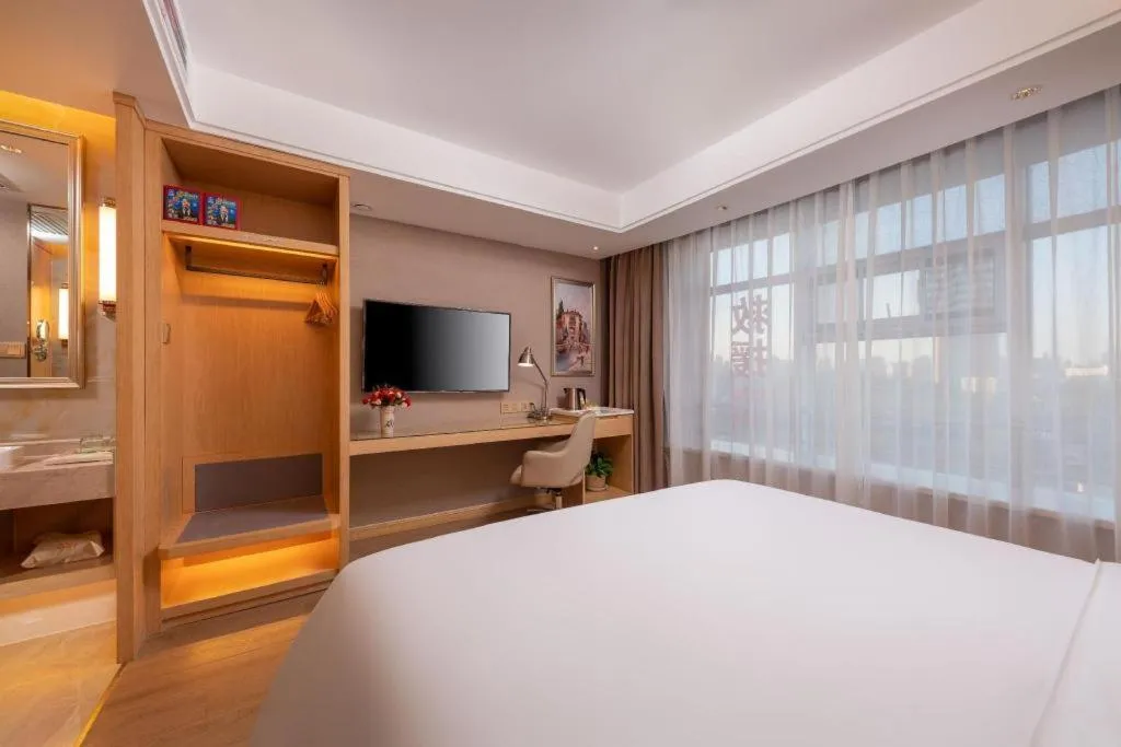 Bed in Vienna Hotel Tianjin Olympic Sports Center Tianta