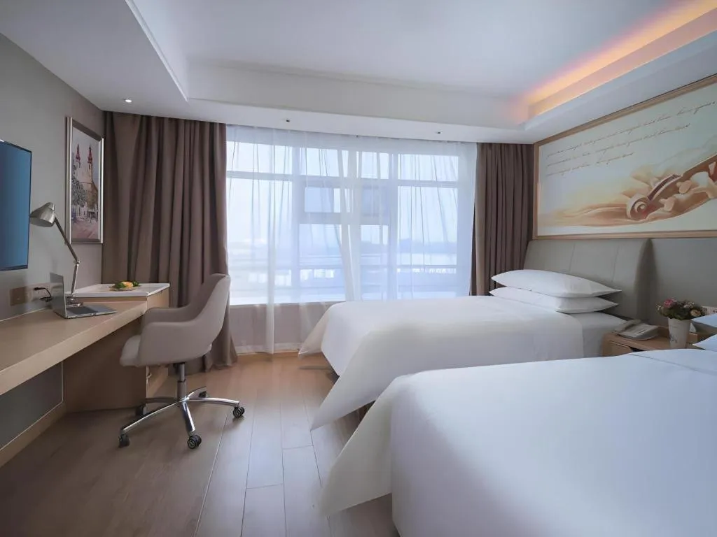 Bed in Vienna Hotel Tianjin Olympic Sports Center Tianta