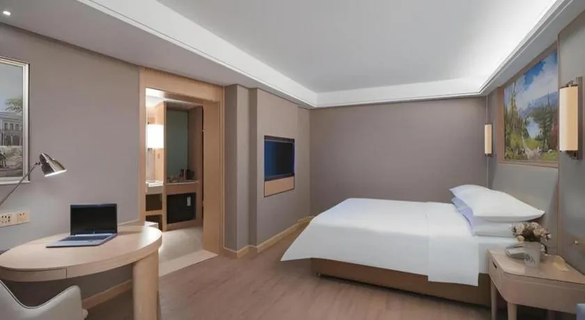 Bed in Vienna Hotel Tianjin Olympic Sports Center Tianta