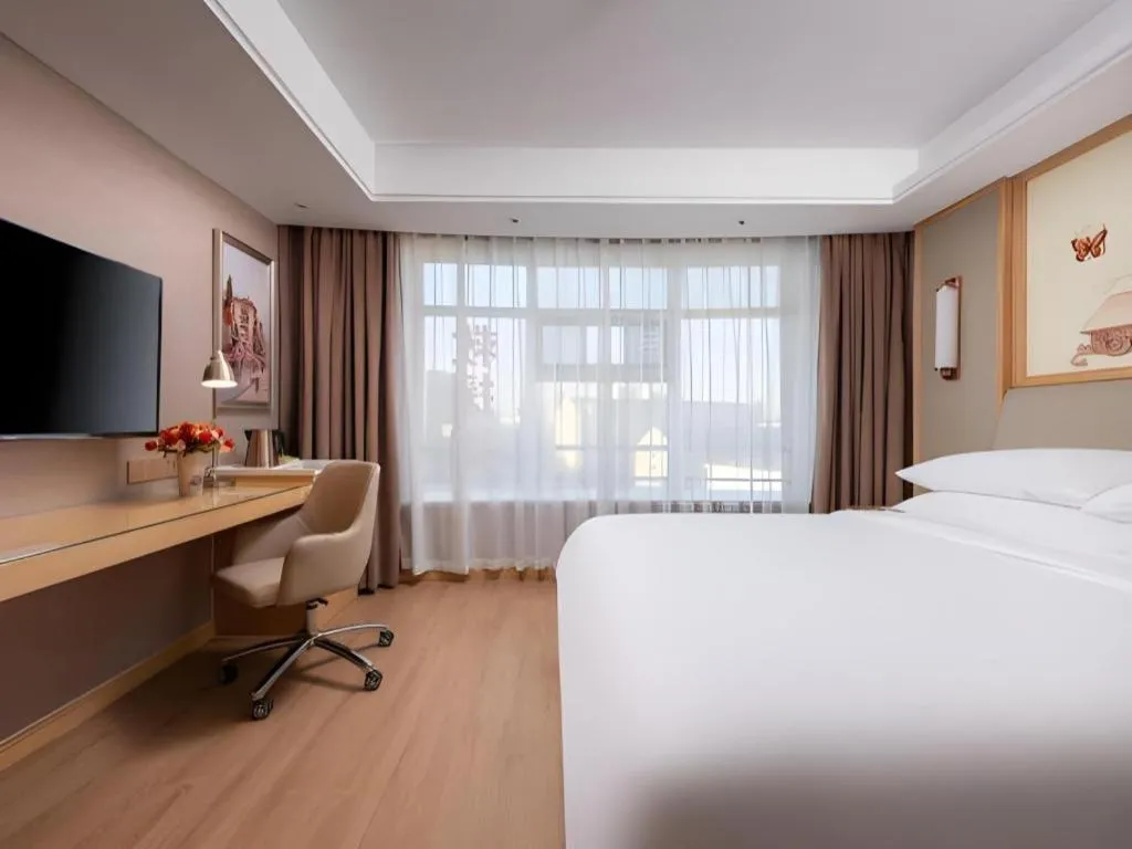 Bed in Vienna Hotel Tianjin Olympic Sports Center Tianta