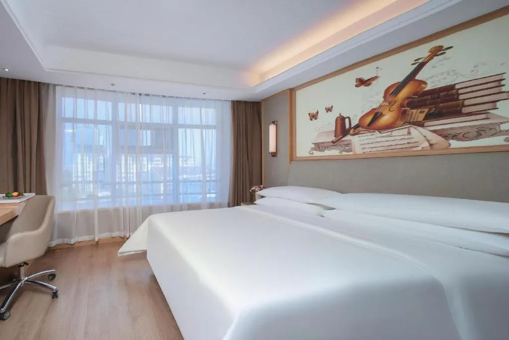 Bed in Vienna Hotel Tianjin Olympic Sports Center Tianta