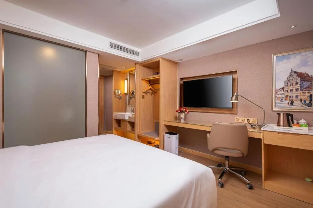 Bed in Vienna Hotel Tianjin Olympic Sports Center Tianta