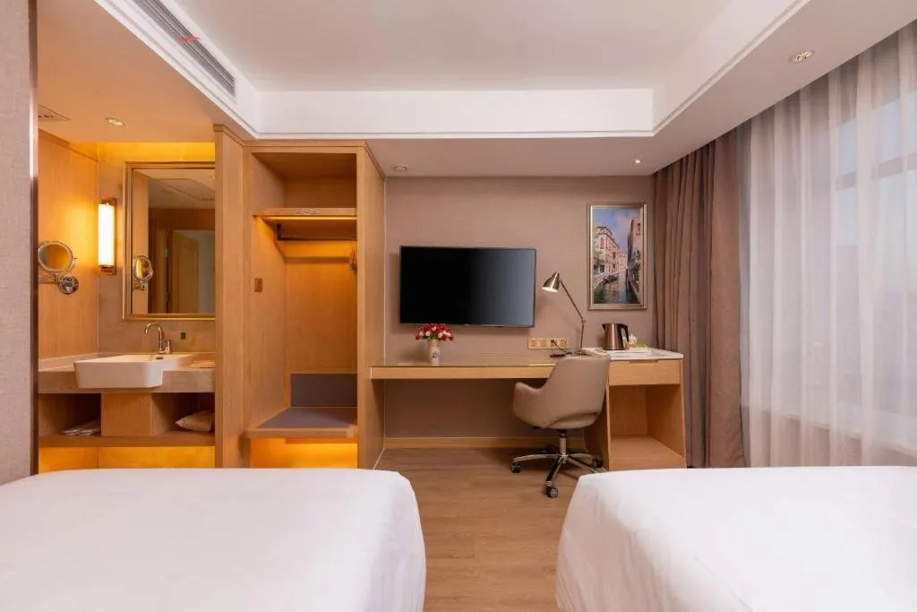 Bed in Vienna Hotel Tianjin Olympic Sports Center Tianta