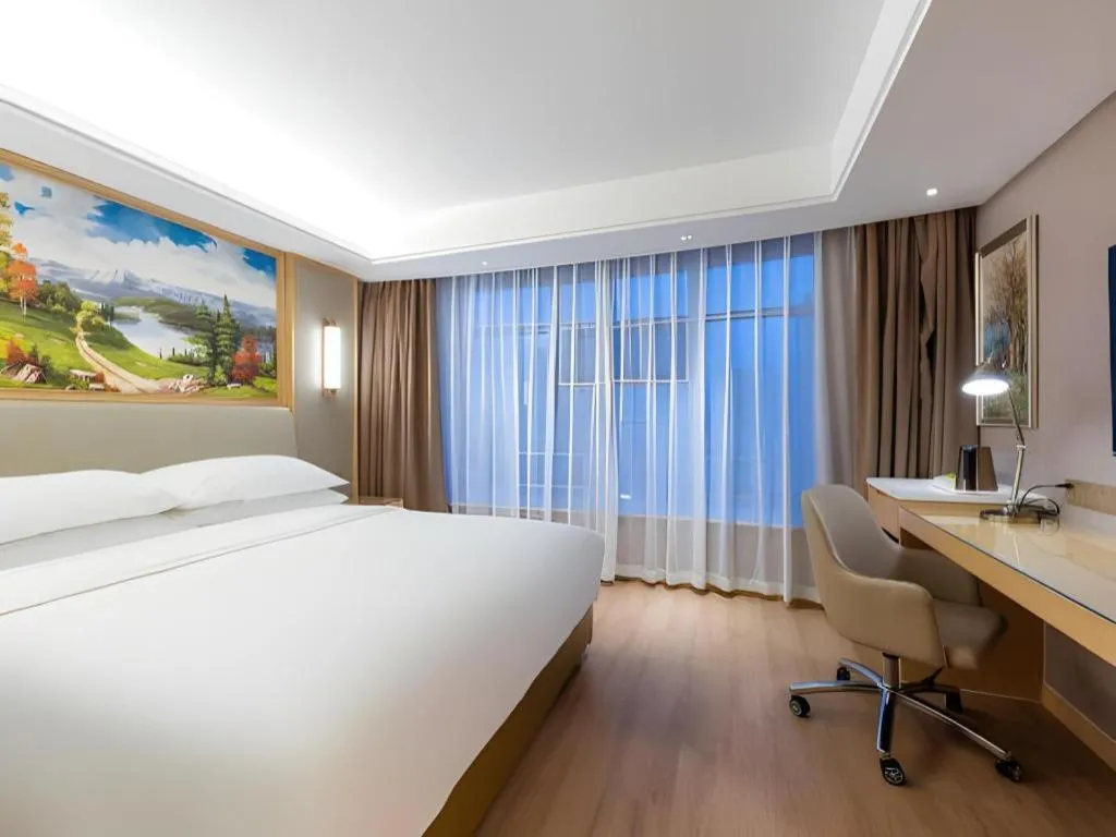 Bed in Vienna Hotel Tianjin Olympic Sports Center Tianta