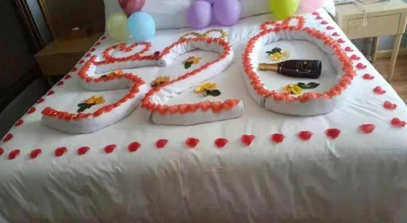 Bed in Vienna Hotel Kunming Baiyun Road Metro Station Jiang'an